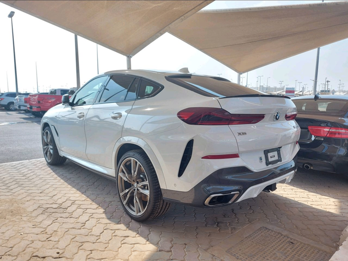 Used BMW X6 40i III (G06), 3.0 l, 2020 in Sharjah by MK Cars, White color. American Specs | AUTO.AE