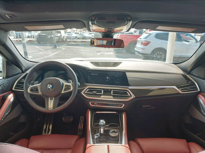 Used BMW X6 40i III (G06), 3.0 l, 2020 in Sharjah by MK Cars, White color. American Specs | AUTO.AE