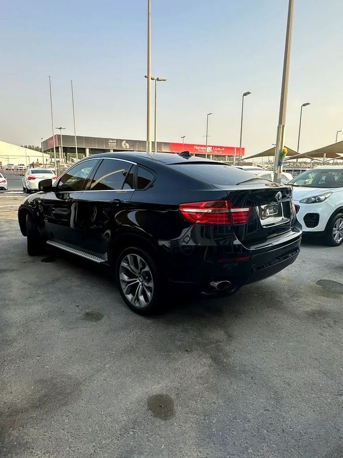 Used BMW X6 50i I (E71) Facelift, 4.4 l, 2013 in Sharjah by Al Haram Al Masy, Black color. GCC Specs | AUTO.AE