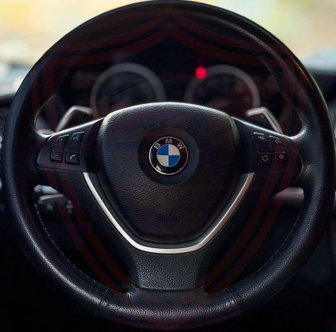 Подержанный BMW X6 35i I (E71) Рестайлинг, 3.0 л, 2014 в Шардже от Al Sayed Khamis Used Auto Trading Коричневый цвет. GCC | AUTO.AE