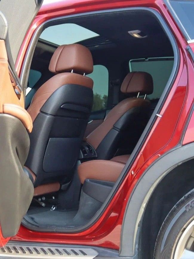 Подержанный BMW X6 50i II (F16), 4.4 л, 2016 в Шардже от Al Sayed Khamis Used Auto Trading Красный цвет. GCC | AUTO.AE