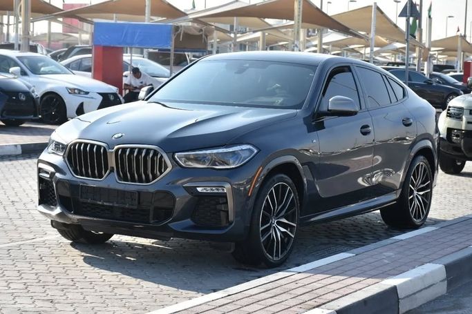 Used BMW X6 M50i III (G06), 4.4 l, 2021 in Sharjah by Alfaris Used Cars, Grey color. Other | AUTO.AE