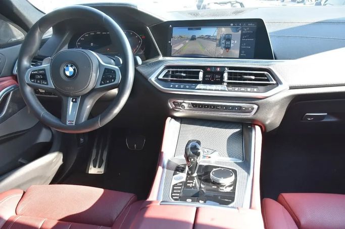 Used BMW X6 M50i III (G06), 4.4 l, 2021 in Sharjah by Alfaris Used Cars, Grey color. Other | AUTO.AE