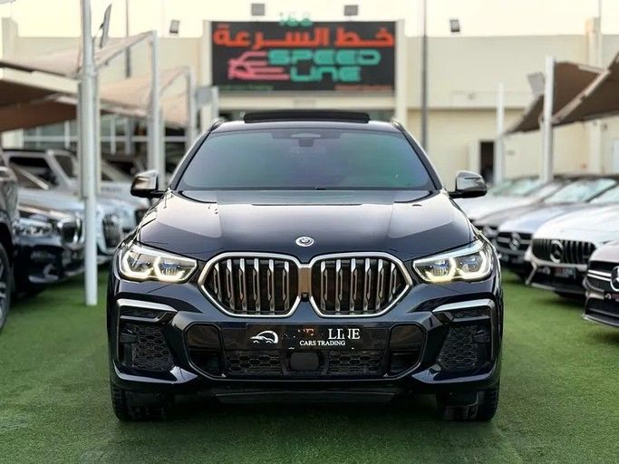 Подержанный BMW X6 M50i III (G06), 4.4 л, 2023 в Шардже от Speed Line Used Cars Синий цвет. GCC | AUTO.AE