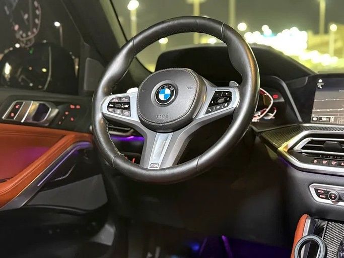 Подержанный BMW X6 M50i III (G06), 4.4 л, 2023 в Шардже от Speed Line Used Cars Синий цвет. GCC | AUTO.AE