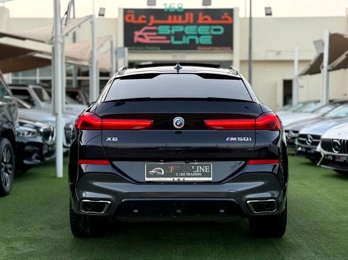 Подержанный BMW X6 M50i III (G06), 4.4 л, 2023 в Шардже от Speed Line Used Cars Синий цвет. GCC | AUTO.AE