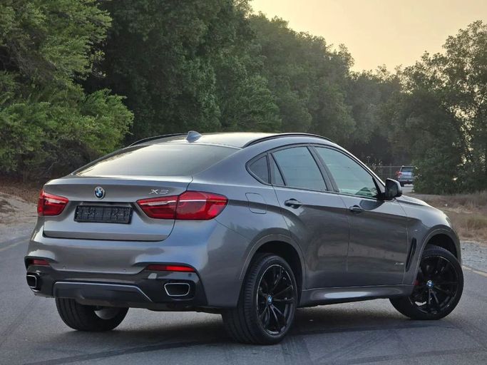 Подержанный BMW X6 35i II (F16), 3.0 л, 2017 в Шардже от Al Jana Used Cars Серый цвет. GCC | AUTO.AE