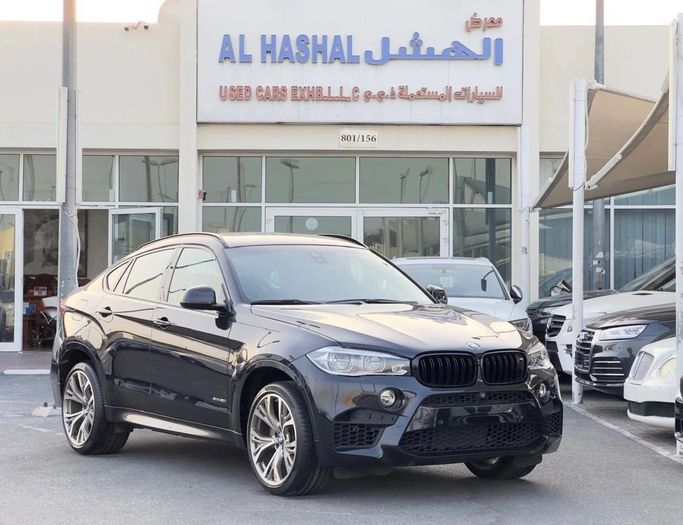 Подержанный BMW X6 50i II (F16), 4.4 л, 2018 в Шардже от Al Hashal Used Cars Коричневый цвет. GCC | AUTO.AE