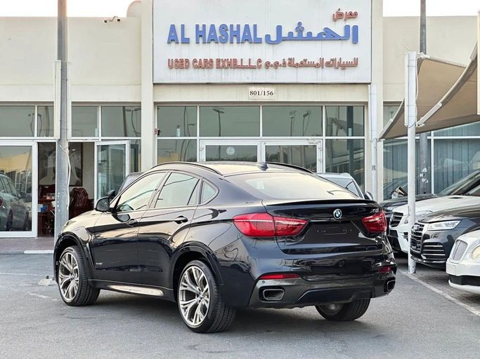 Подержанный BMW X6 50i II (F16), 4.4 л, 2018 в Шардже от Al Hashal Used Cars Коричневый цвет. GCC | AUTO.AE