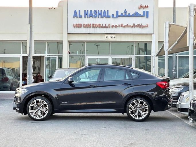 Подержанный BMW X6 50i II (F16), 4.4 л, 2018 в Шардже от Al Hashal Used Cars Коричневый цвет. GCC | AUTO.AE