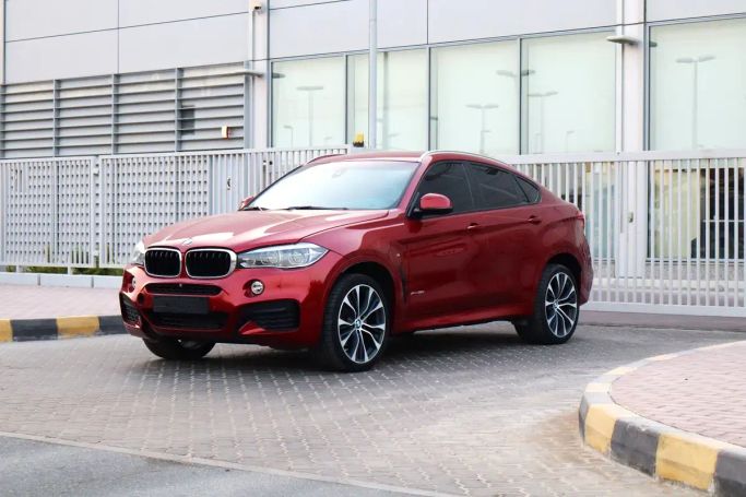 Подержанный BMW X6 35i xDrive II (F16), 3.0 л, 2019 в Шардже от Sama Al Sham Cars Красный цвет. GCC | AUTO.AE