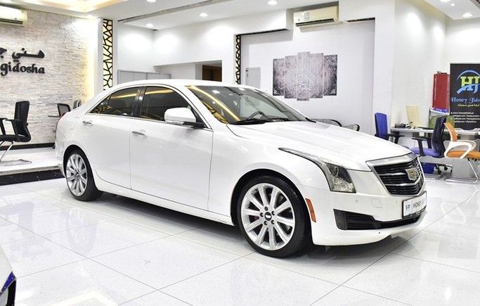 Подержанный Cadillac ATS I Рестайлинг, 2.0 л, 2015 в Шардже от Honey Gidosha Used Cars Tr. Белый цвет.  | AUTO.AE