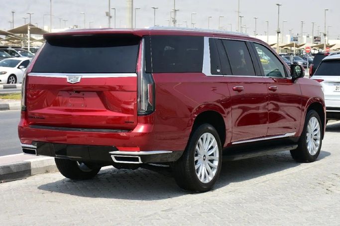 Подержанный Cadillac Escalade ESV V, 6.2 л, 2021 в Шардже от Alfaris Used Cars Красный цвет. Other | AUTO.AE
