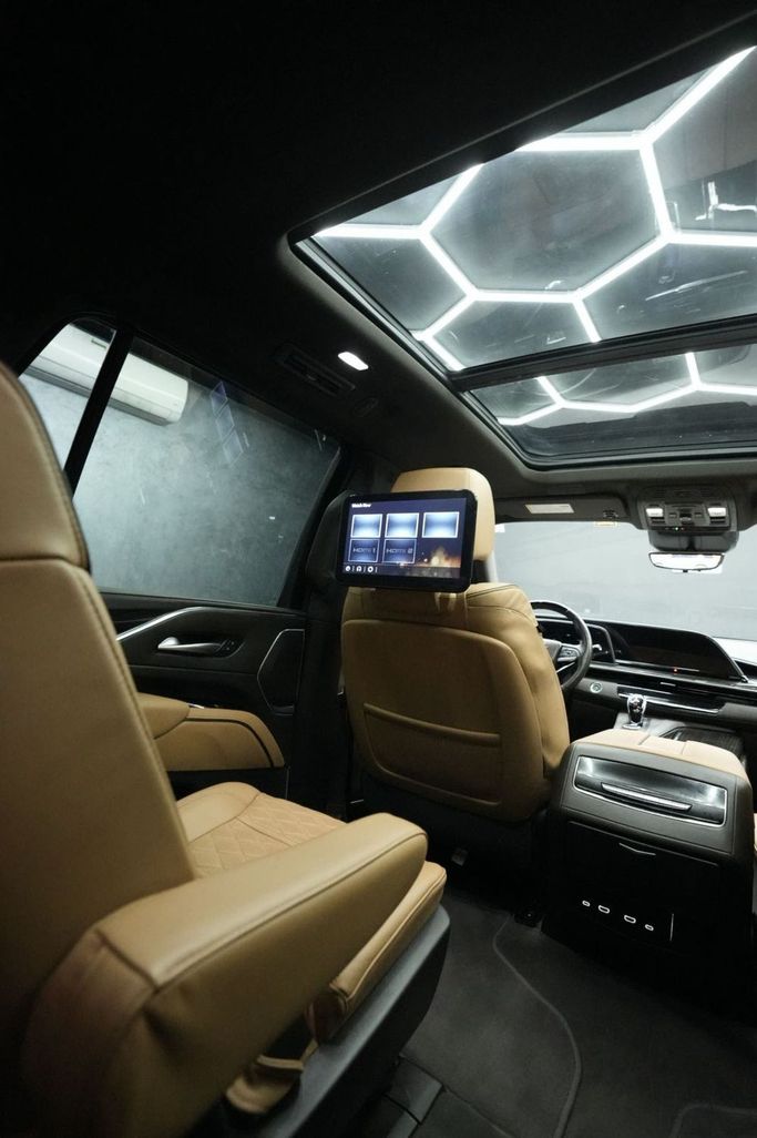 Used Cadillac Escalade V, 6.2 l, 2023 in Sharjah by Najmat Almajarah Motors, White color. American Specs | AUTO.AE