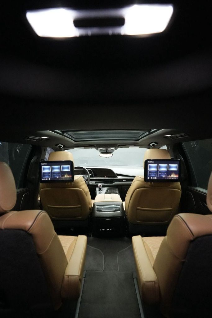 Used Cadillac Escalade V, 6.2 l, 2023 in Sharjah by Najmat Almajarah Motors, White color. American Specs | AUTO.AE