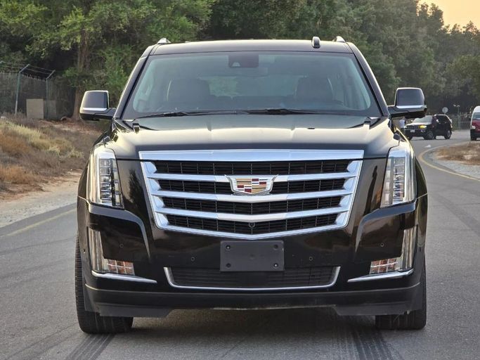 Подержанный Cadillac Escalade IV, 6.2 л, 2020 в Шардже от Al Jana Used Cars Черный цвет. GCC | AUTO.AE