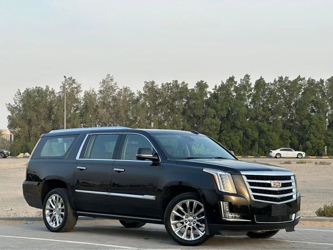 Подержанный Cadillac Escalade ESV IV, 6.2 л, 2020 в Шардже от Al Jana Used Cars Черный цвет. GCC | AUTO.AE