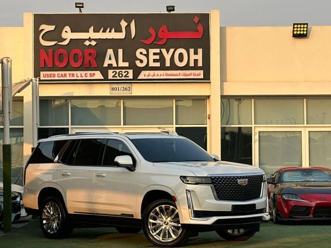 Used Cadillac Escalade V, 6.2 l, 2022 in Sharjah by Noor Al Seyoh Used Cars, White color. GCC Specs | AUTO.AE
