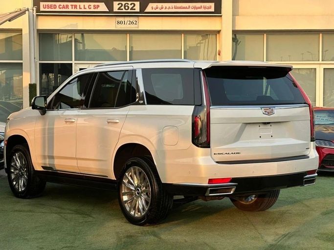 Used Cadillac Escalade V, 6.2 l, 2022 in Sharjah by Noor Al Seyoh Used Cars, White color. GCC Specs | AUTO.AE