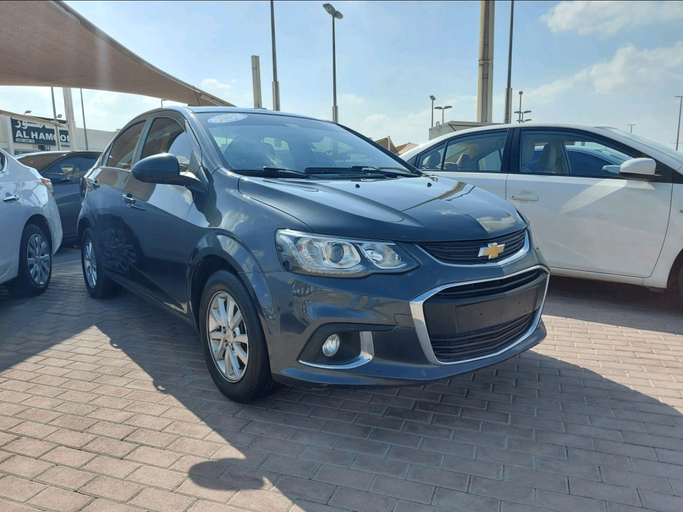 Подержанный Chevrolet Aveo II, 1.6 л, 2017 в Шардже от Alhamoor Used Cars Серый цвет. GCC | AUTO.AE