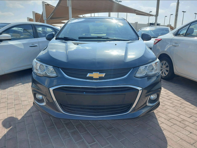 Подержанный Chevrolet Aveo II, 1.6 л, 2017 в Шардже от Alhamoor Used Cars Серый цвет. GCC | AUTO.AE