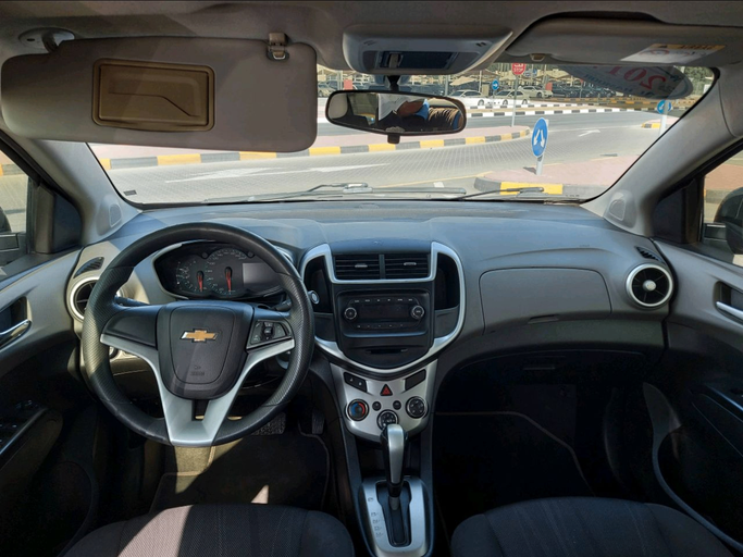 Подержанный Chevrolet Aveo II, 1.6 л, 2017 в Шардже от Alhamoor Used Cars Серый цвет. GCC | AUTO.AE