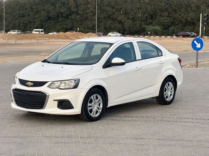 Подержанный Chevrolet Aveo II Рестайлинг, 1.4 л, 2018 в Шардже от Al Aayan Used Cars Белый цвет. GCC | AUTO.AE