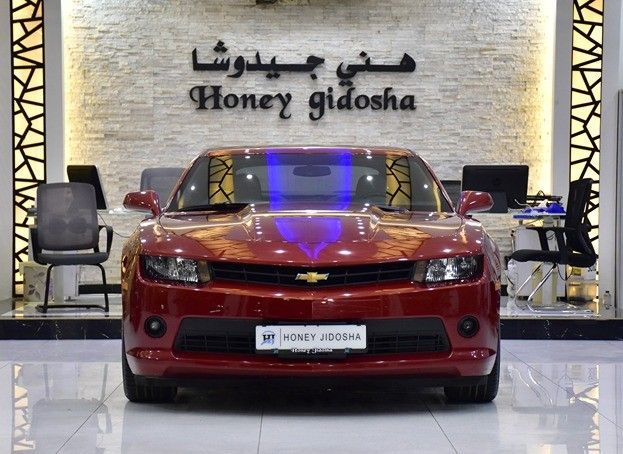 Подержанный Chevrolet Camaro V Рестайлинг, 3.6 л, 2015 в Шардже от Honey Gidosha Used Cars Tr. Красный цвет.  | AUTO.AE