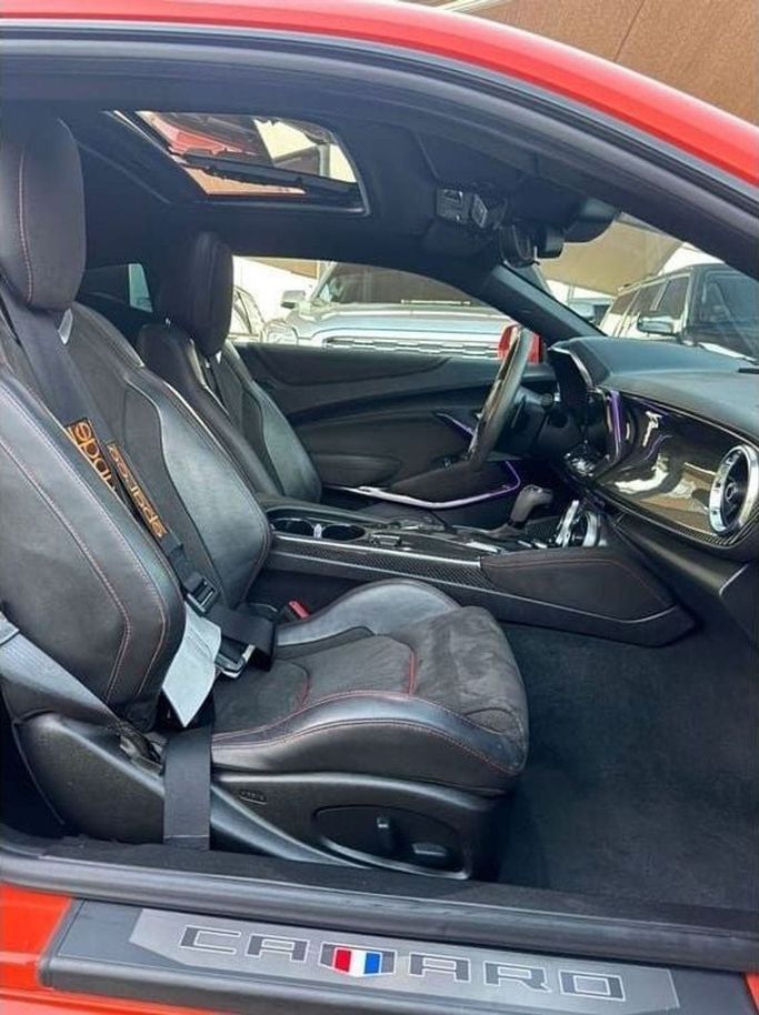 Used Chevrolet Camaro VI Facelift, 6.2 l, 2019 in Sharjah by Noor Al Seyoh Used Cars, Orange color. GCC Specs | AUTO.AE