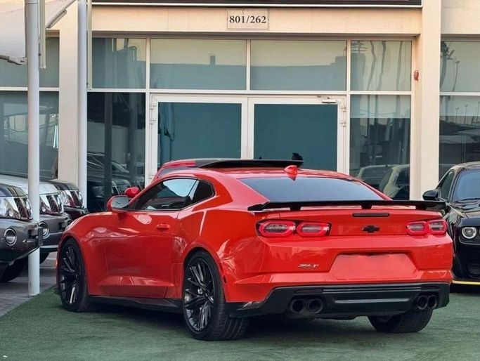 Used Chevrolet Camaro VI Facelift, 6.2 l, 2019 in Sharjah by Noor Al Seyoh Used Cars, Orange color. GCC Specs | AUTO.AE