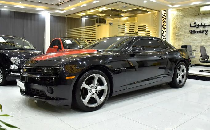Подержанный Chevrolet Camaro V Рестайлинг, 3.6 л, 2014 в Шардже от Honey Jidosha Used Cars Tr. Черный цвет. GCC | AUTO.AE | Объявление #273352