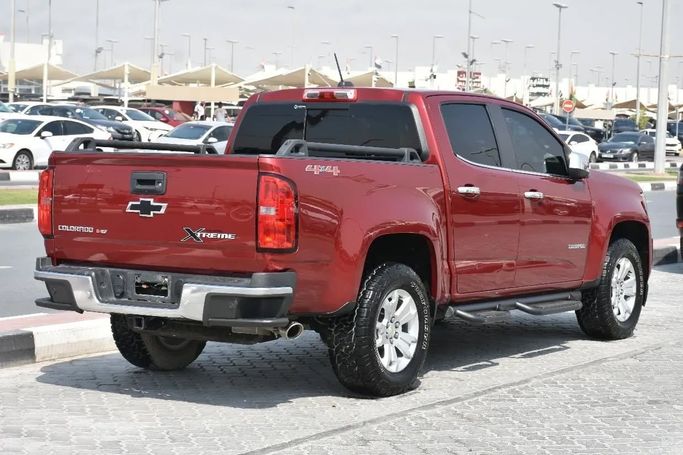 Подержанный Chevrolet Colorado II, 3.6 л, 2020 в Шардже от Alfaris Used Cars Красный цвет. Other | AUTO.AE