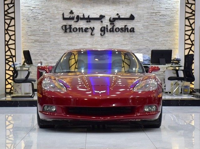 Подержанный Chevrolet Corvette C6, 6.2 л, 2011 в Шардже от Honey Gidosha Used Cars Tr. Красный цвет.  | AUTO.AE