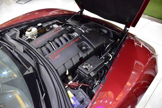 Подержанный Chevrolet Corvette C6, 6.2 л, 2011 в Шардже от Honey Gidosha Used Cars Tr. Красный цвет.  | AUTO.AE