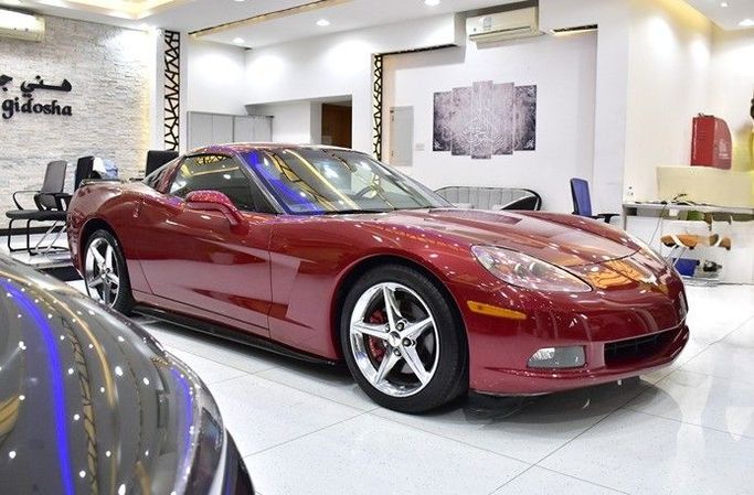 Подержанный Chevrolet Corvette C6, 6.2 л, 2011 в Шардже от Honey Gidosha Used Cars Tr. Красный цвет.  | AUTO.AE