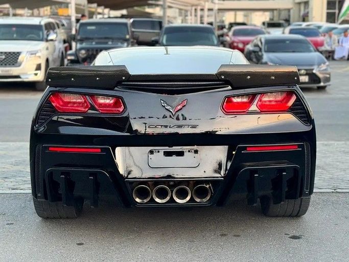 Подержанный Chevrolet Corvette C7, 6.2 л, 2019 в Шардже от Al Fakhamah Used Cars Черный цвет. GCC | AUTO.AE