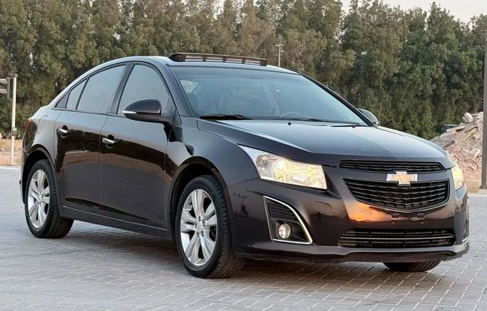 Подержанный Chevrolet Cruze I Рестайлинг, 1.6 л, 2014 в Шардже от Laqtah Used Cars Черный цвет. GCC | AUTO.AE | Объявление #272735