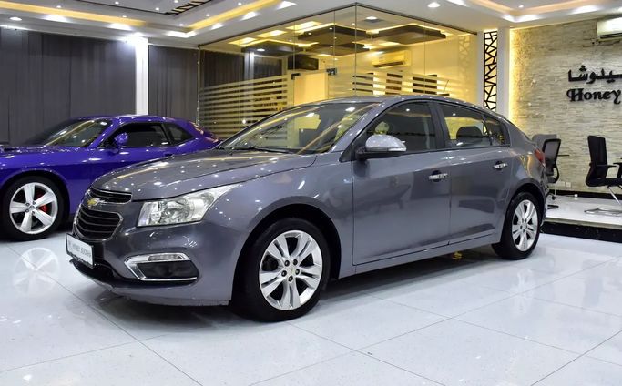 Подержанный Chevrolet Cruze I Рестайлинг, 1.6 л, 2016 в Шардже от Honey Jidosha Used Cars Tr. Серый цвет. GCC | AUTO.AE | Объявление #273344