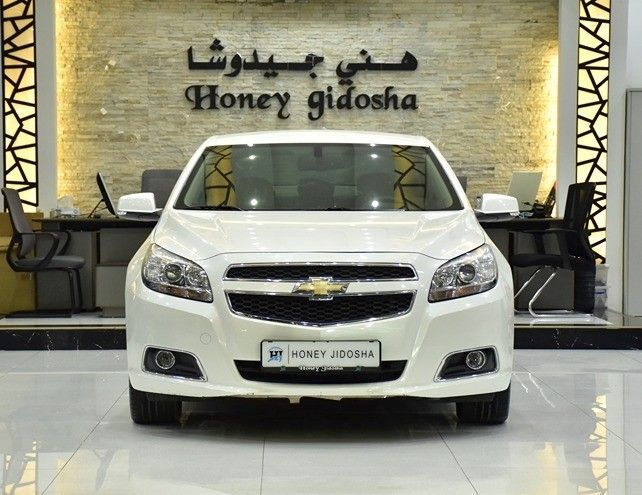Подержанный Chevrolet Malibu VIII Рестайлинг, 2.5 л, 2016 в Шардже от Honey Jidosha Used Cars Tr. Белый цвет. GCC | AUTO.AE | Объявление #253324