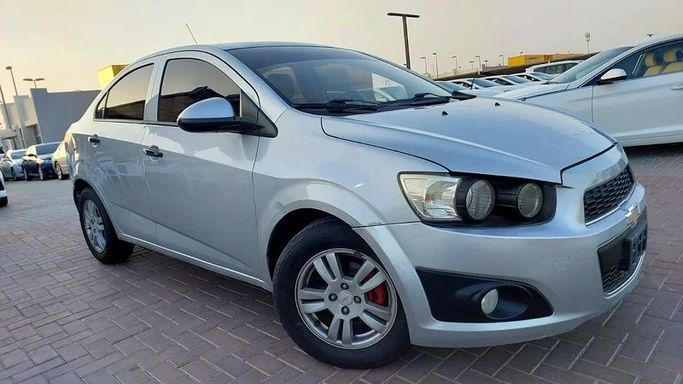 Used Chevrolet Sonic I, 1.8 l, 2014 in Sharjah by Al Aqsa Used Cars, Silver color. GCC Specs | AUTO.AE