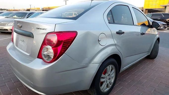 Used Chevrolet Sonic I, 1.8 l, 2014 in Sharjah by Al Aqsa Used Cars, Silver color. GCC Specs | AUTO.AE