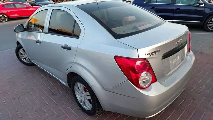 Used Chevrolet Sonic I, 1.8 l, 2014 in Sharjah by Al Aqsa Used Cars, Silver color. GCC Specs | AUTO.AE