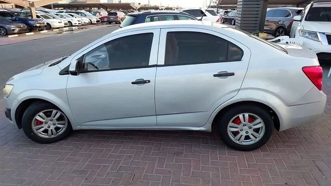 Used Chevrolet Sonic I, 1.8 l, 2014 in Sharjah by Al Aqsa Used Cars, Silver color. GCC Specs | AUTO.AE
