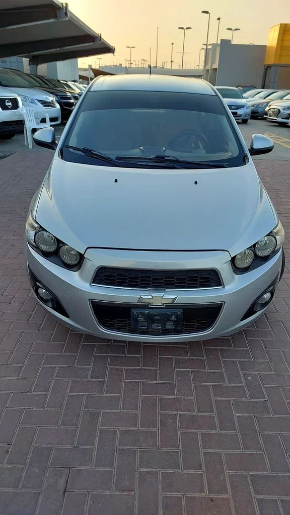 Used Chevrolet Sonic I, 1.8 l, 2014 in Sharjah by Al Aqsa Used Cars, Silver color. GCC Specs | AUTO.AE