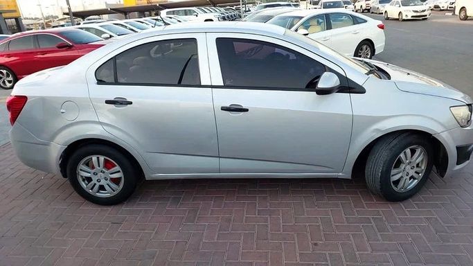 Used Chevrolet Sonic I, 1.8 l, 2014 in Sharjah by Al Aqsa Used Cars, Silver color. GCC Specs | AUTO.AE