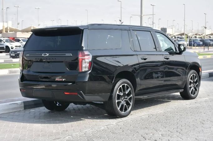 Подержанный Chevrolet Suburban XII, 5.3 л, 2021 в Шардже от Alfaris Used Cars Черный цвет. Other | AUTO.AE