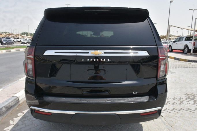 Подержанный Chevrolet Tahoe V Рестайлинг, 5.3 л, 2024 в Шардже от Alfaris Used Cars Черный цвет.  | AUTO.AE