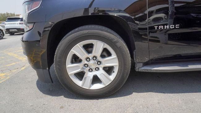 Used Chevrolet Tahoe IV, 6.2 l, 2018 in Sharjah by Alnujoom Al Malakiah Used Cars, Black color. GCC Specs | AUTO.AE