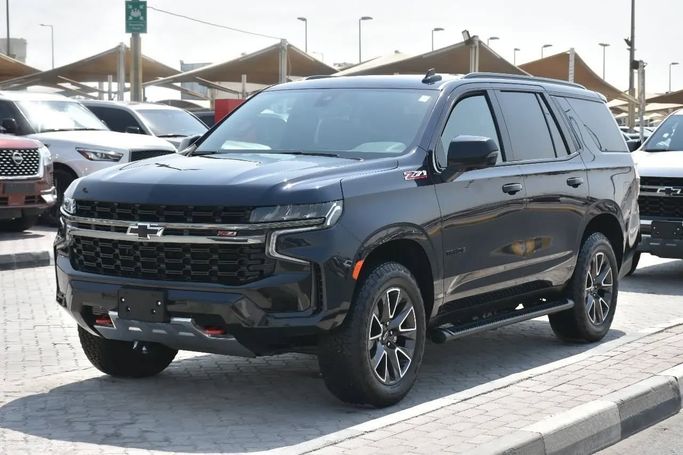 Подержанный Chevrolet Tahoe V, 5.3 л, 2022 в Шардже от Alfaris Used Cars Черный цвет. Other | AUTO.AE