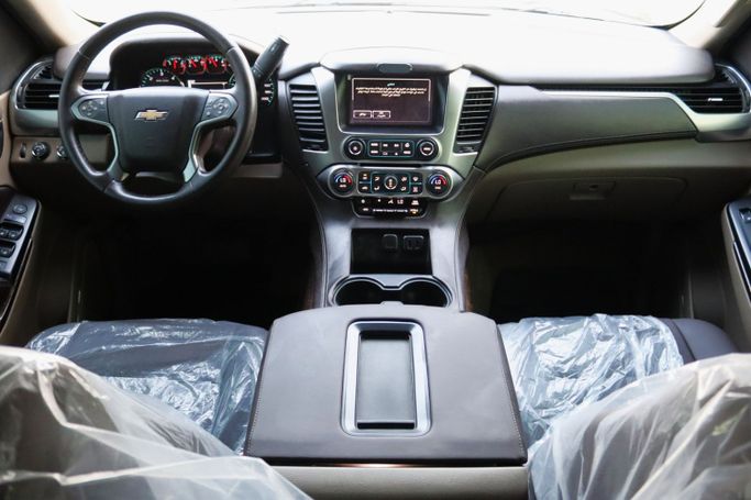Подержанный Chevrolet Tahoe IV, 5.3 л, 2017 в Шардже от Dar Al Hay Used Cars Коричневый цвет. Other | AUTO.AE